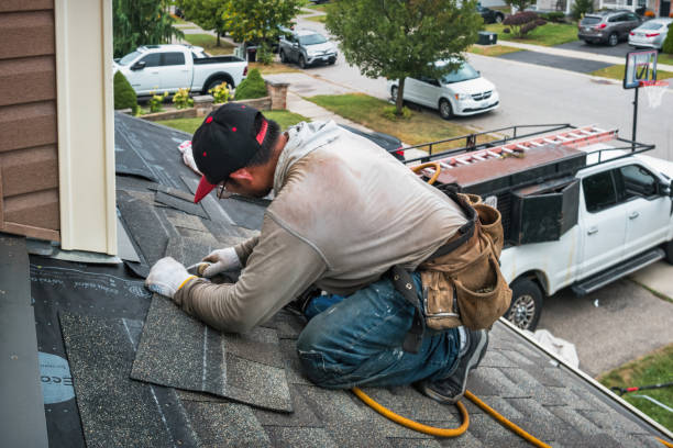 Professional Roofing technician working in New Hyde Park, NY